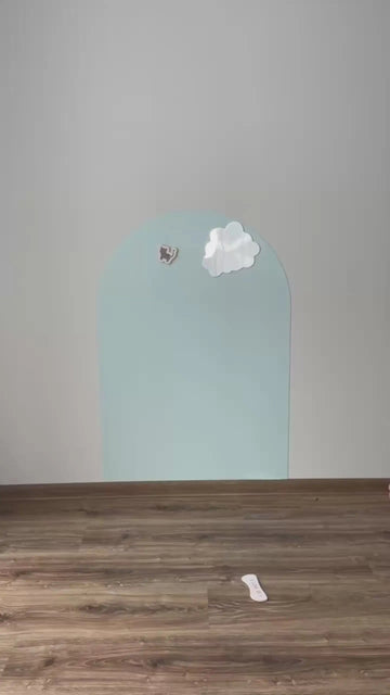 Two kids playing on a Tix&Mix magnetic wall decal in blue dream color.