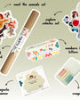 A product display of Tix&Mix Family Favorites Bundle that contains a magnetic wall decal, animals set, mirror, crayons, numbers and letters, and vehicles set.
