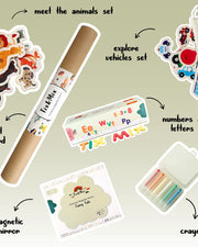 A product display of Tix&Mix Family Favorites Bundle that contains a magnetic wall decal, animals set, mirror, crayons, numbers and letters, and vehicles set.