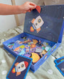 A kid playing with Tix&Mix space exploration playset in a playroom.