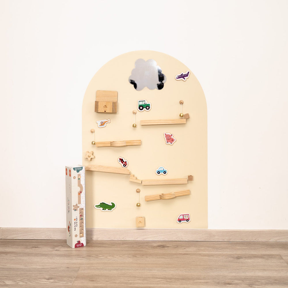 A Tix&Mix marble track product placed on a magnetic wall decal for kids.