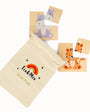 A Tix&Mix wooden magnetic animal puzzle set and a beige Animals Puzzle pouch.