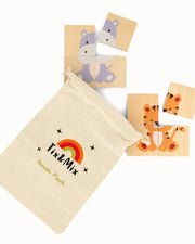 A Tix&Mix wooden magnetic animal puzzle set and a beige Animals Puzzle pouch.