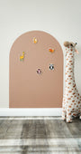 A product display of Tix&Mix brown magnetic wall decal for kids placed on a clean white wall.