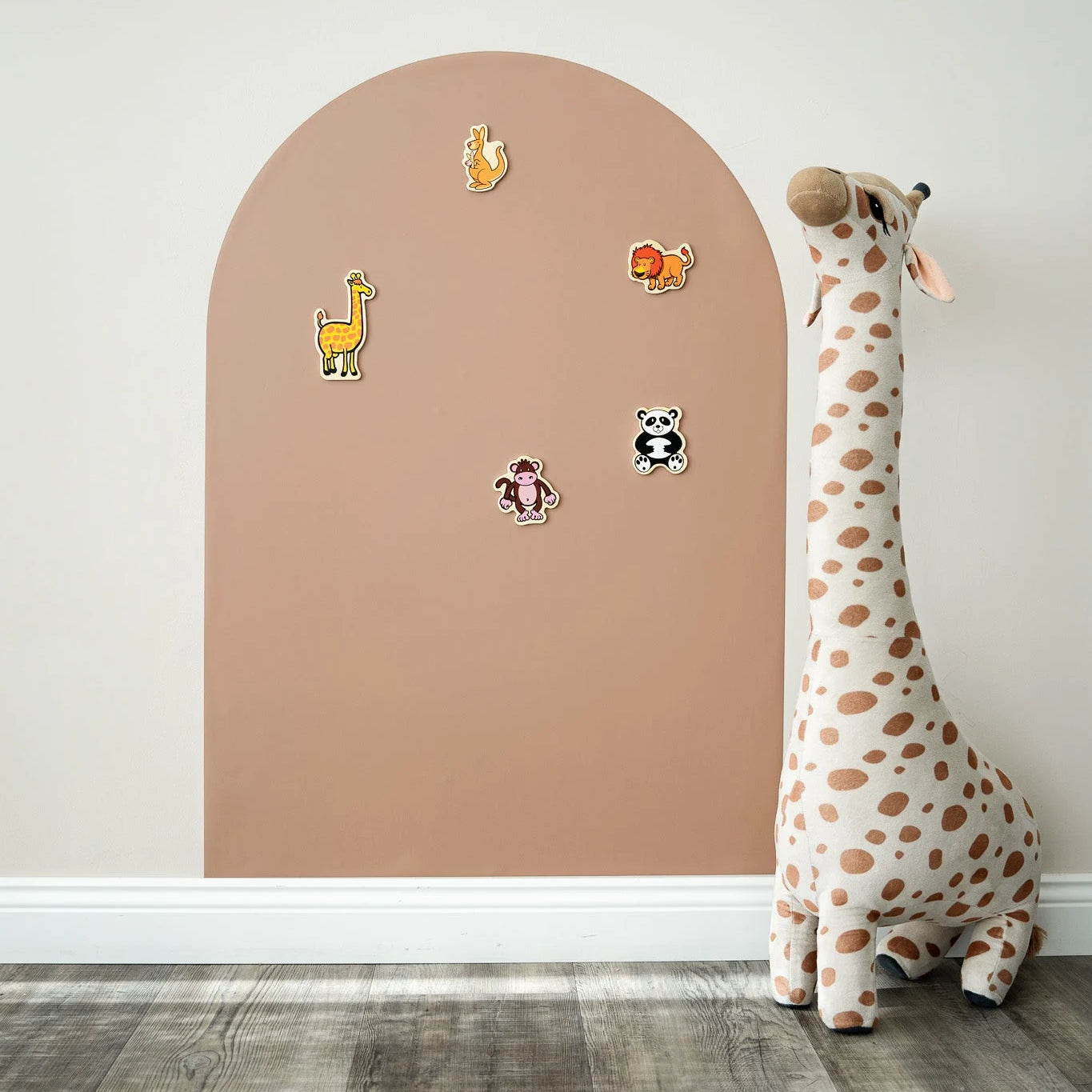 A product display of Tix&Mix brown magnetic wall decal with wooden animal toys and a giraffe toy on the side.