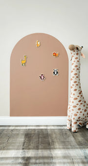 A product display of Tix&Mix brown magnetic wall decal with wooden animal toys and a giraffe toy on the side.