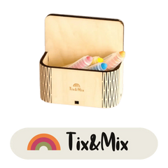 A collection of crayons in different colors organized in a Tix&Mix magic box perfect for toddlers to use in a magnetic wall decal.