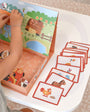 A female kid playing with Tix&Mix magnetic farm toys.