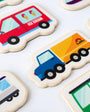 A closeup photo of Tix&Mix wooden magnetic vehicles playset.