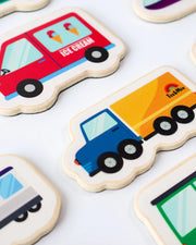 A closeup photo of Tix&Mix wooden magnetic vehicles playset.