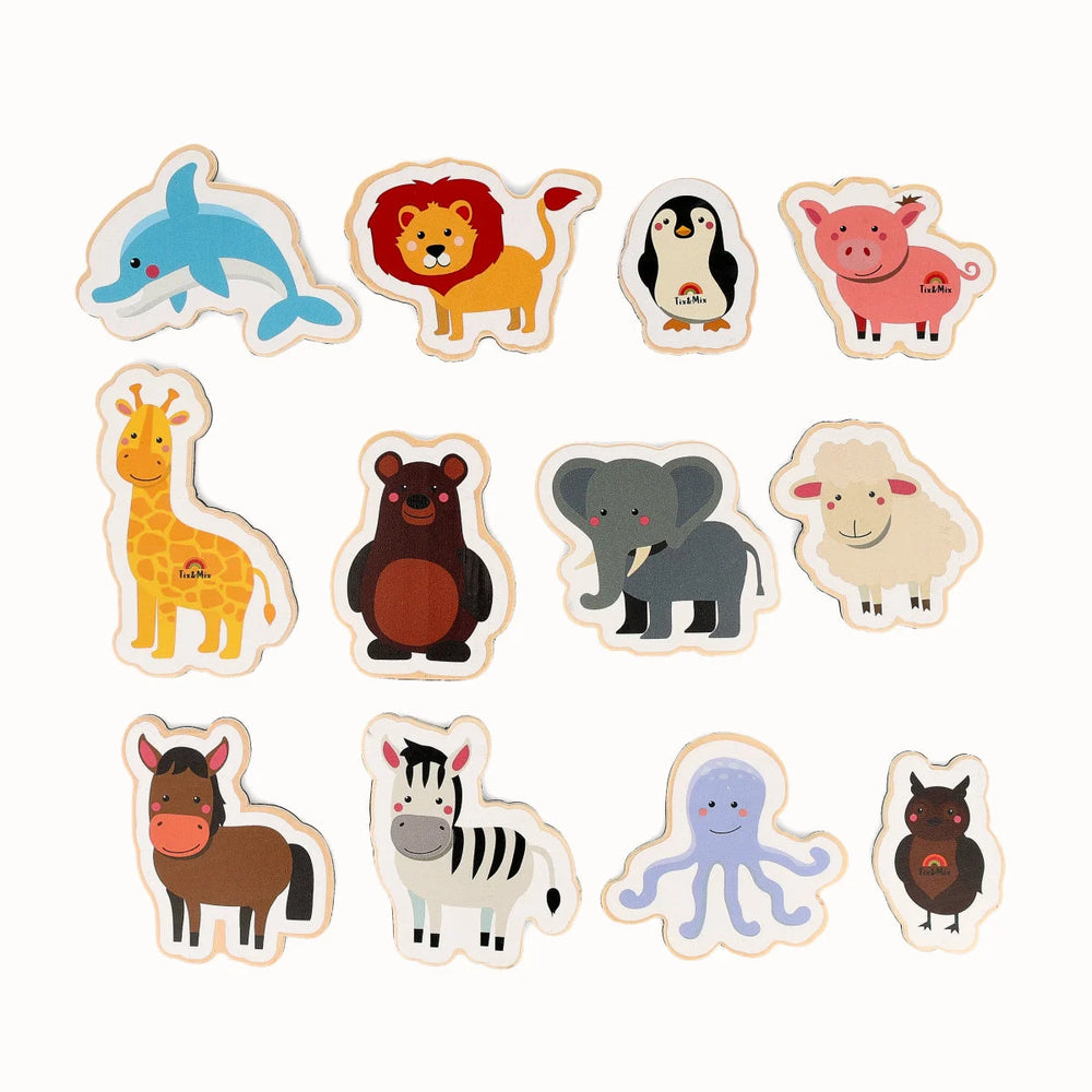 A collection of Tix&Mix wooden magnetic animals playset on a white background.