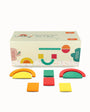 Colorful geometric shape blocks with a packaging box on a white background