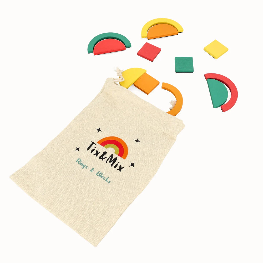 A colorful Rings and Blocks playset and a beige pouch on a white background.