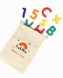 A colorful Tix&Mix wooden magnetic letters and numbers and a beige pouch.