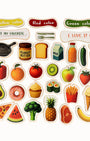 A Tix&Mix magnetic food set for toddlers featuring colorful fruits, vegetables, snacks, and everyday foods labeled by color categories like red, yellow, and green.