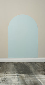 A Tix&Mix cyan blue magnetic wall decal secured on a clean wall.
