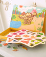 Tix & Mix Farm Discovery Set for kids with colorful dinosaur-themed magnetic pieces and activity boards in a wooden storage box.