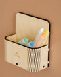 Five colorful crayons stored in a Tix&Mix magnetic wooden magic box.