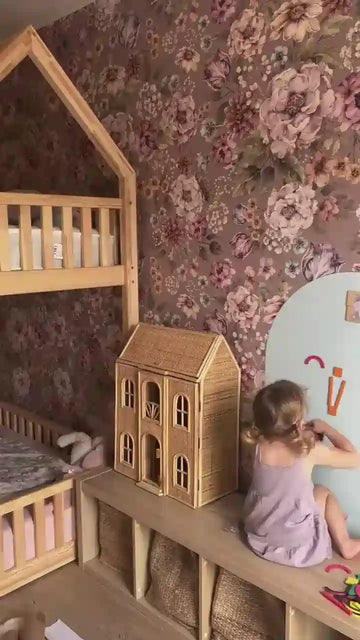 A child playing with Tix&Mix magnetic toys on a magnetic wall decal.